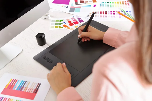 Artist drawing on graphic tablet