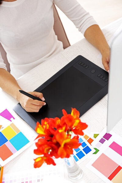 Artist drawing on graphic tablet