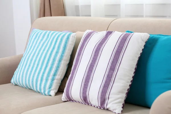 Comfortable sofa with colourful pillows — Stock Photo, Image