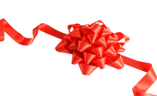 Red bow with curved ribbon isolated — Stock Photo, Image