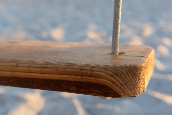 Wooden teeter on beach — Stock Photo, Image