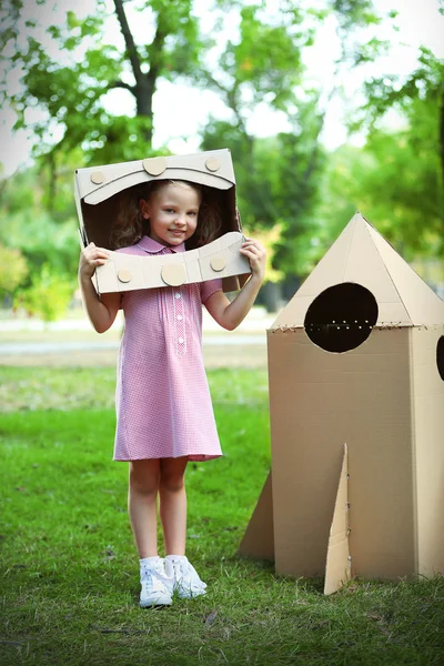 Little girl in box — Stock Photo, Image