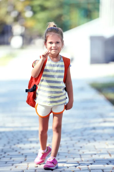 Little girl with school bag — Stock Photo, Image