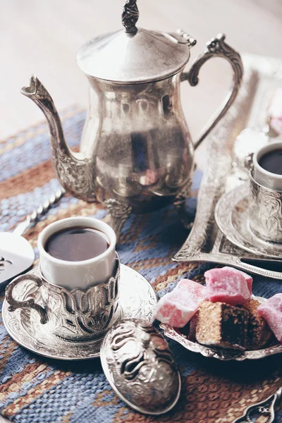 Antique tea-set with Turkish delight on table close-up — Stock Photo, Image