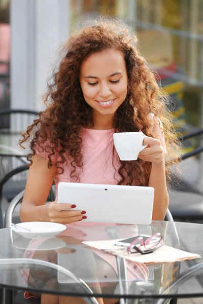 Beautiful young lady with tablet — Stock Photo, Image