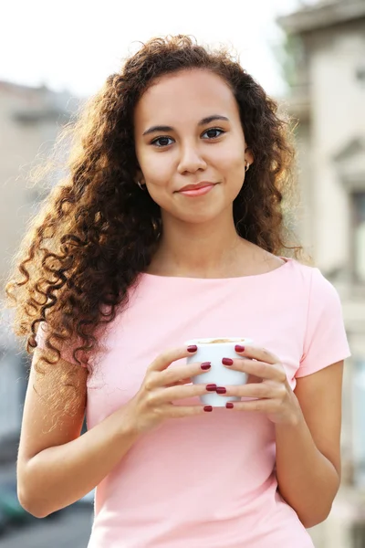 Woman drinking coffee at summer terrace — Stock Photo, Image