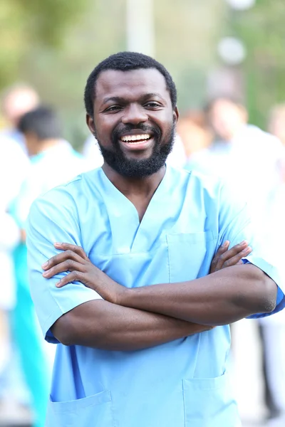 Portrait Handsome Smiling Doctor Blurred Background — Stock Photo, Image