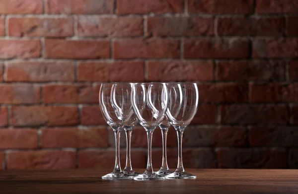 Empty wine glasses on a table — Stock Photo, Image