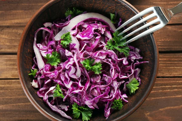 Red cabbage salad served in bowl closeup — Stock Photo, Image