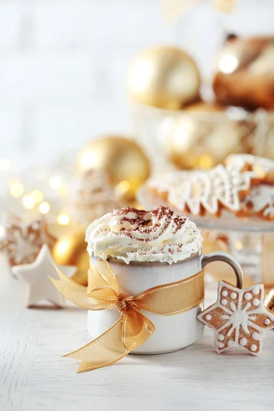 Beautiful composition with cup of cappuccino and Christmas cookies — Stock Photo, Image