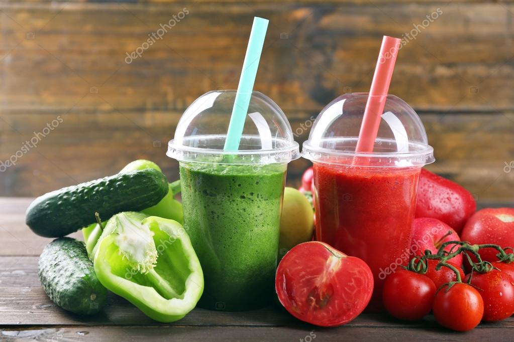 Are Fruit Cups In Juice Healthy Fresh juice mix fruit, healthy drinks in plastic cups on wooden