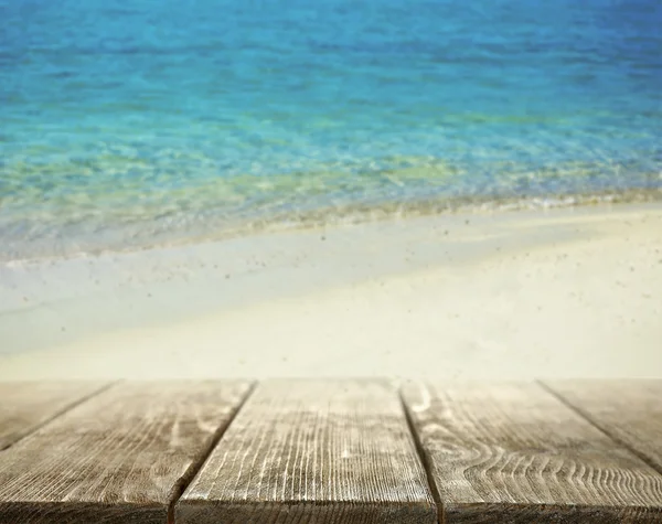 Tablones de madera en el fondo de la costa del mar — Foto de Stock