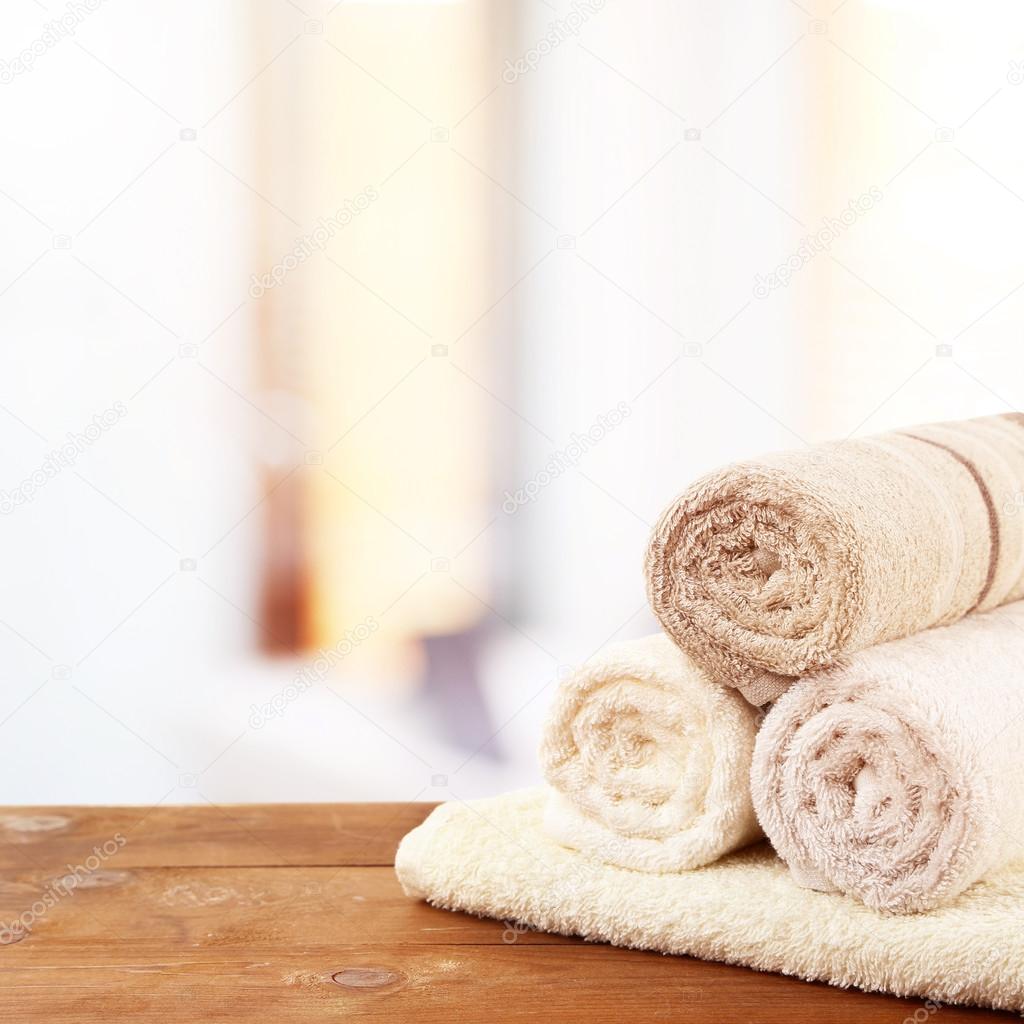 Rolled bath towels Stock Photo by ©belchonock 89248994