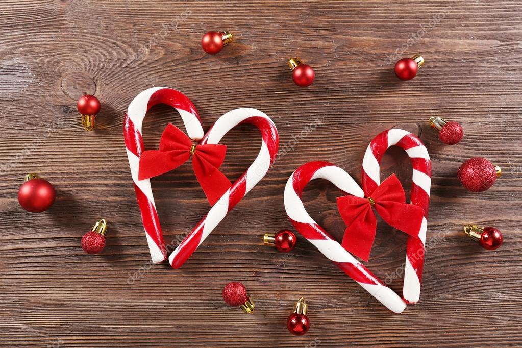 Christmas Candy Canes With Christmas Decoration On Table Close Up