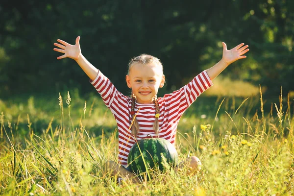 Small girl with watermelon Stock Photo