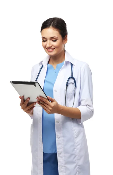 Uśmiechający się lekarz trzymając tabletkę — Zdjęcie stockowe