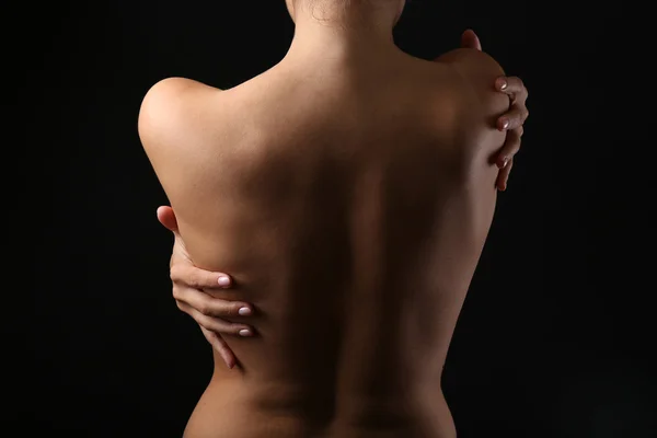 Woman 's naked back — стоковое фото