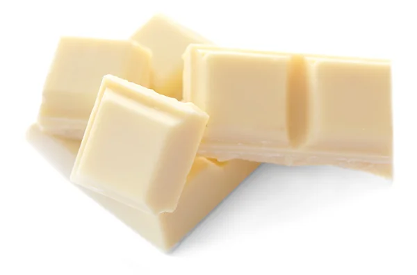 Witte chocolade stukken geïsoleerd op witte achtergrond — Stockfoto