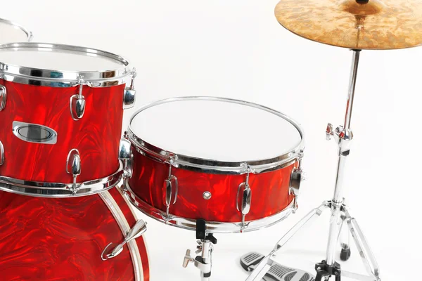Set red drums geïsoleerd op een witte achtergrond, close-up — Stockfoto
