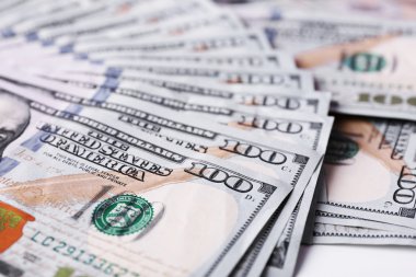 Birçok yüz dolar nakit para arka plan olarak