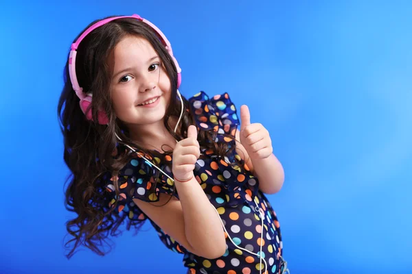 Happy little girl in colourful shir — Stock Photo, Image