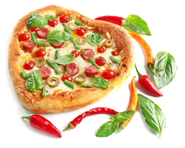 Tasty heart shaped pizza decorated with hot peppers and basil isolated on white background — Stock Photo, Image