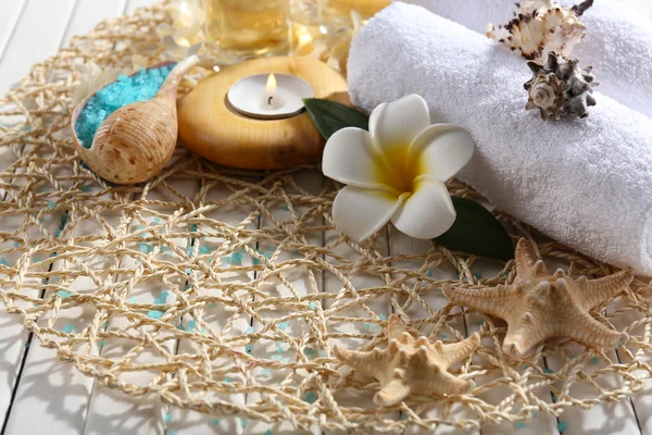 Decorated spa composition on wicker serviette, close up — Stock Photo, Image