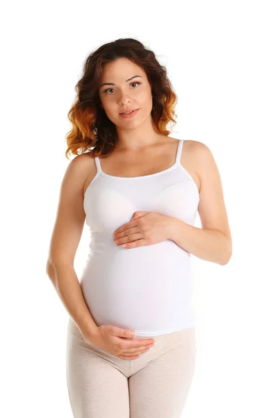 Jonge gelukkig zwangere vrouw geïsoleerd op witte achtergrond — Stockfoto