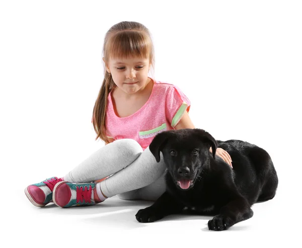 Schattig meisje met puppy — Stockfoto