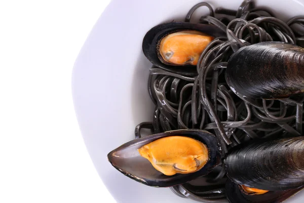 A plate of pasta and mussel, isolated on white — Stock Photo, Image