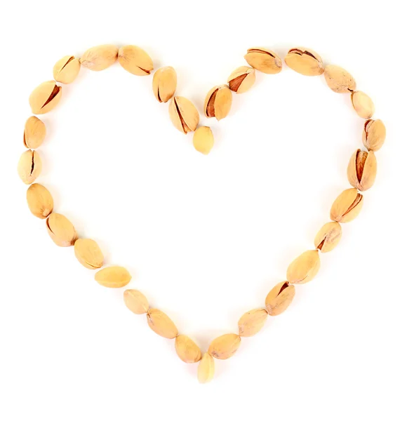 Heart shaped peanuts — Stock Photo, Image