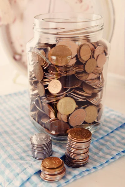 Coins in money jar