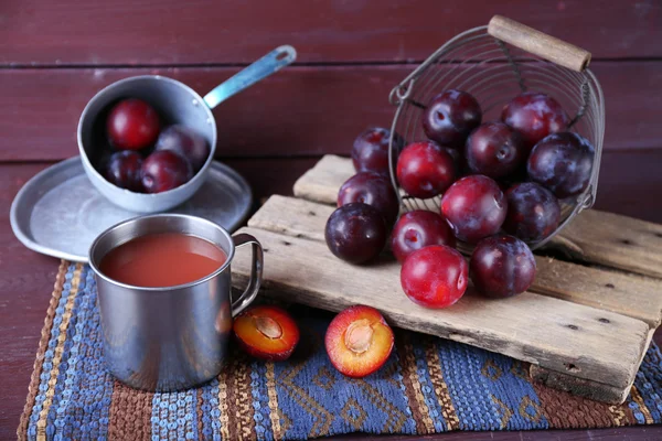 Delicious plum juice with fruits — Stock Photo, Image