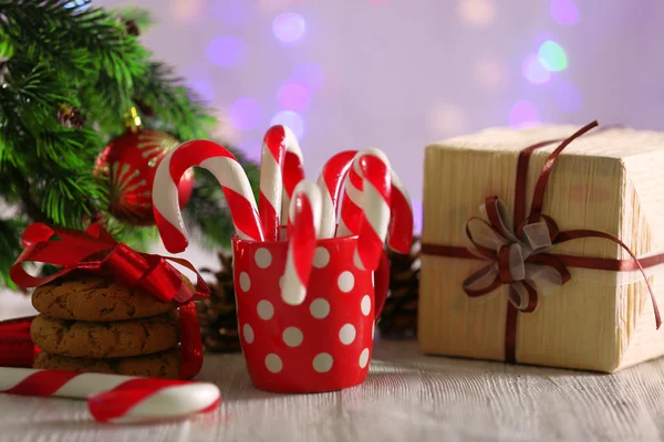 Christmas Candy Canes in cup — Stockfoto