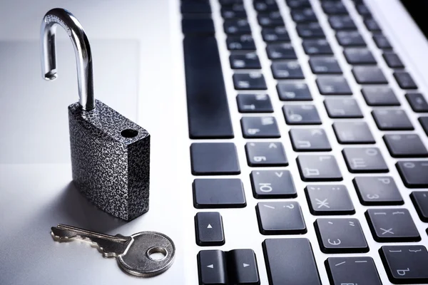 Lock on the laptop keyboard background, close up — Stock Photo, Image