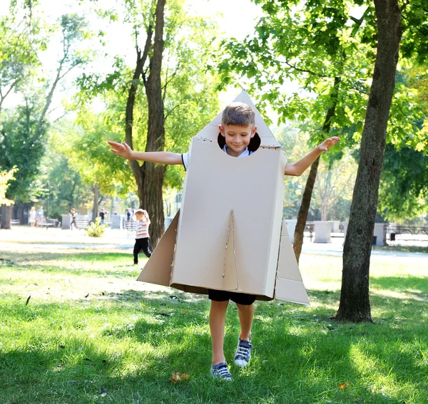 Funny boy in carton helmet — Stock Photo, Image