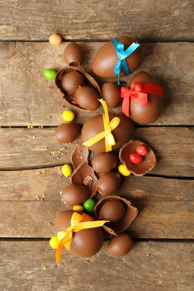 Chocolate Easter eggs on wooden background — Stock Photo, Image