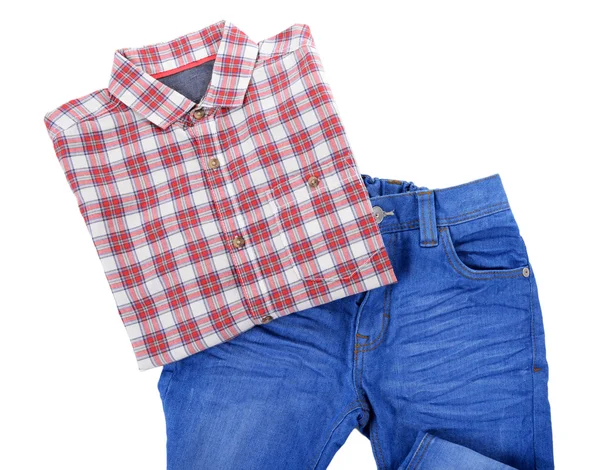 Pantalones vaqueros azules con camisa a cuadros roja aislada sobre fondo blanco —  Fotos de Stock