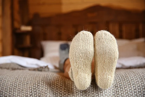 Legs of woman in warm socks — Stock Photo, Image