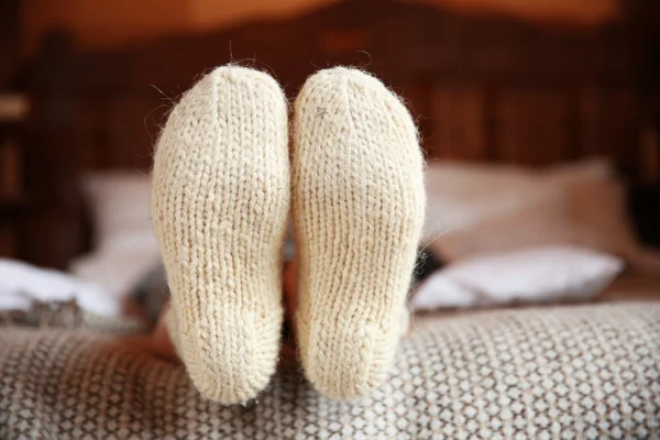 Legs of woman in warm socks — Stock Photo, Image