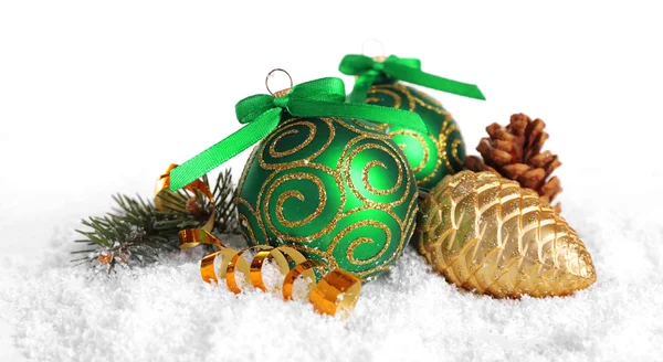 Christmas balls on snow with white background — Stock Photo, Image