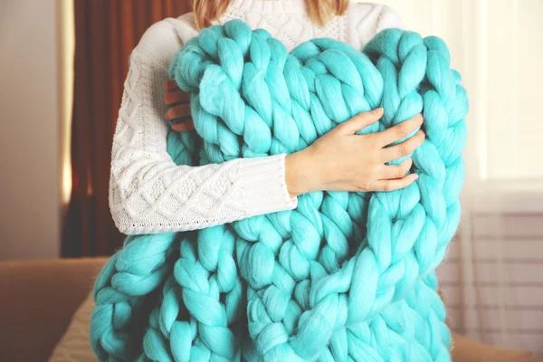 Woman  with hand made blanket