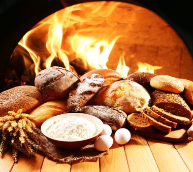 Taze ekmek ekmek üzerinde arka plan soba