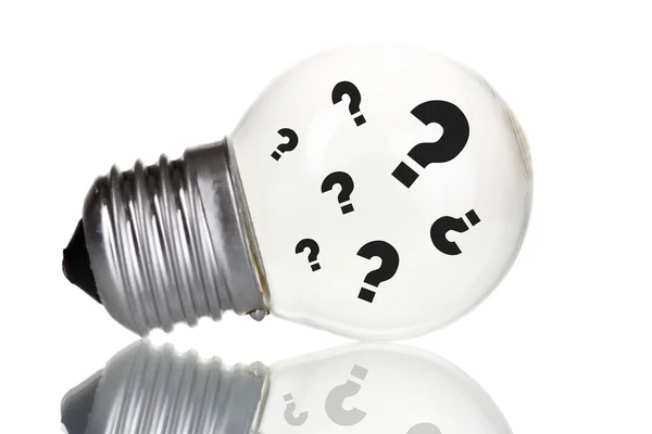 Pontos de interrogação na lâmpada — Fotografia de Stock