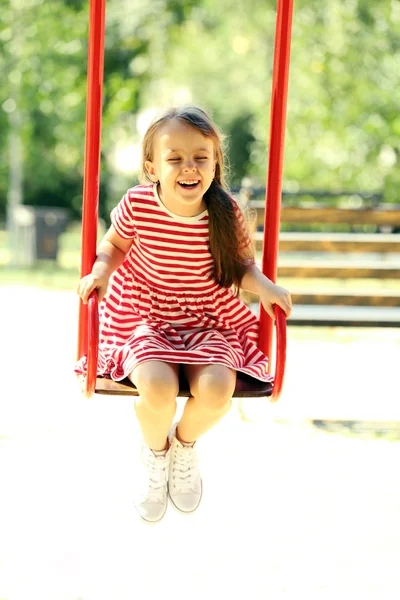 Little girl on swing — Stock Photo, Image