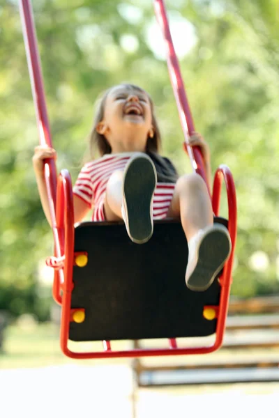 Little girl on swing — Stock Photo, Image