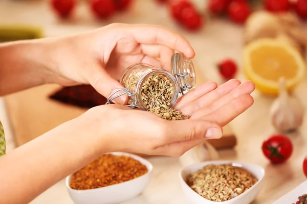Mint in the jar and variety of spices — Stock Photo, Image