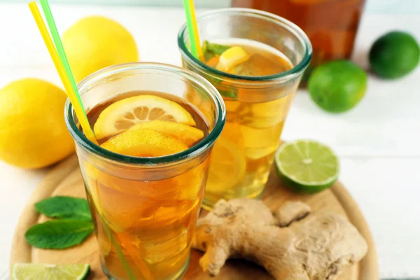 Iced tea with lemon on light wooden background — Stock Photo, Image