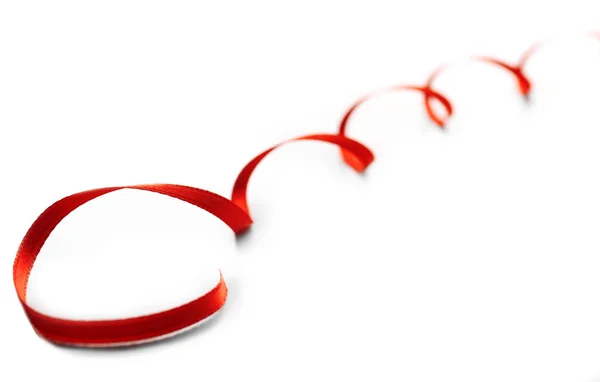 Red ribbon isolated on white — Stock Photo, Image