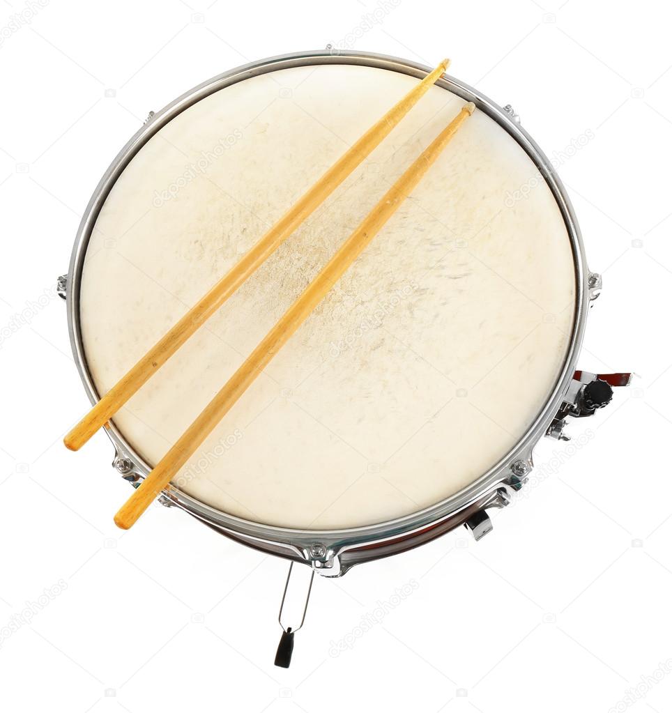 Red drum with drum sticks isolated on white background, close up